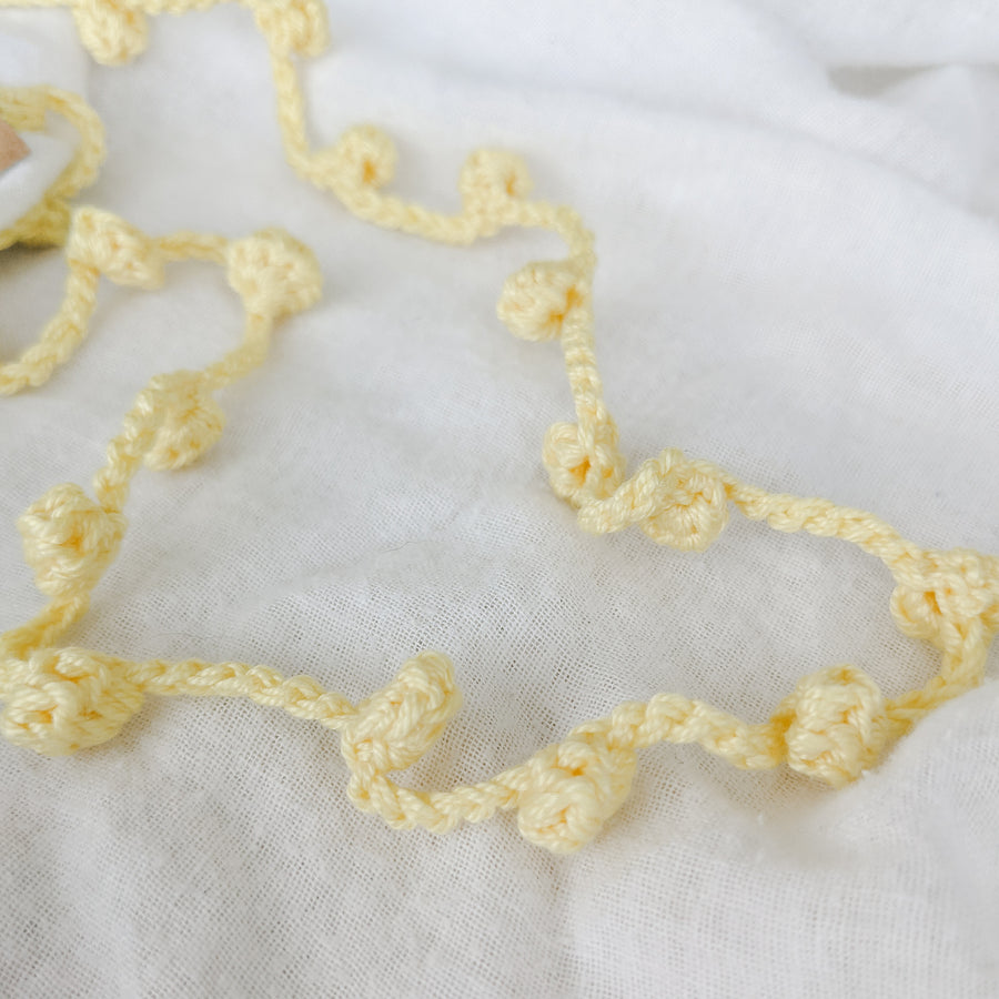 A beautiful hand crocheted garland made from 100% cotton. Perfect for children's  bedrooms or as  a sustainable decor option for special occasions like baby showers and birthdays. 