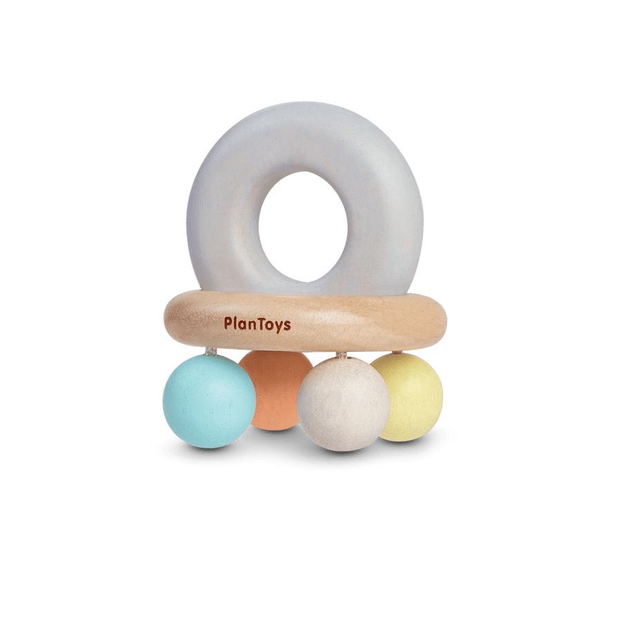 Wooden toy rattle with an easy-grasp handle. 