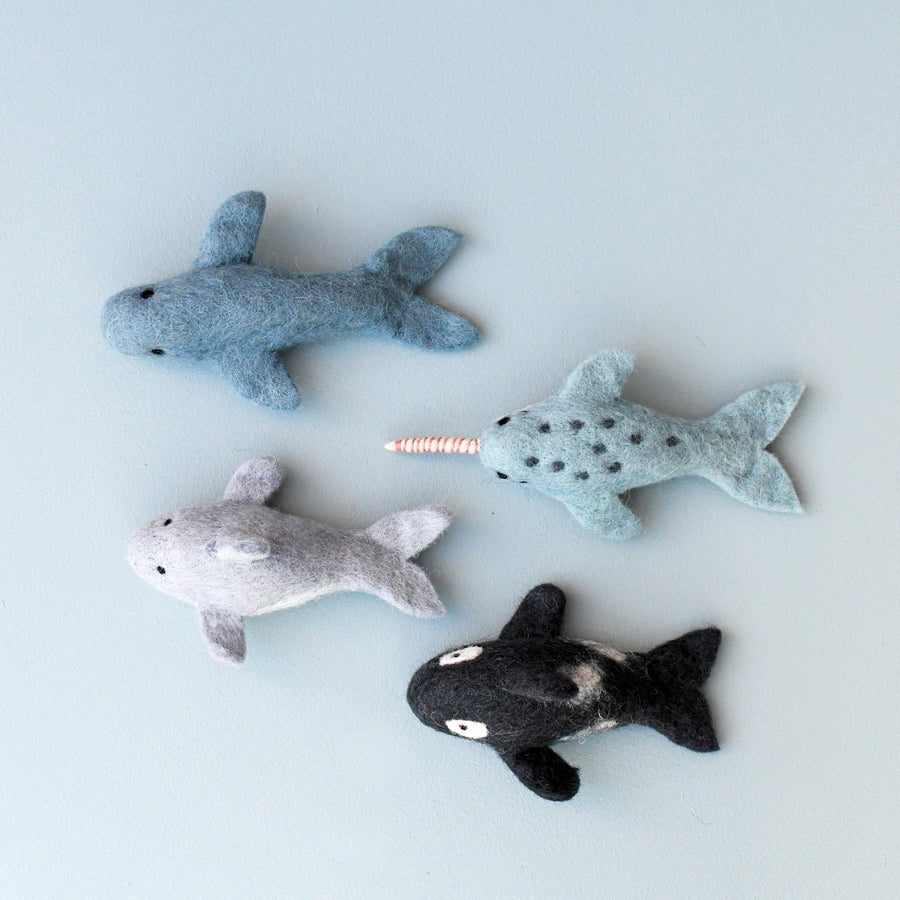 Fairtrade, felt marine mammal toys, including a narwhal, orca and dolphin and killer whale. Ethically-made and eco-friendly. 