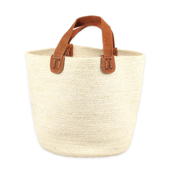 This beautiful cream bucket tote is made from jute and has two brown suede handles. Designed in New Zealand and ethically made in Bangladesh.