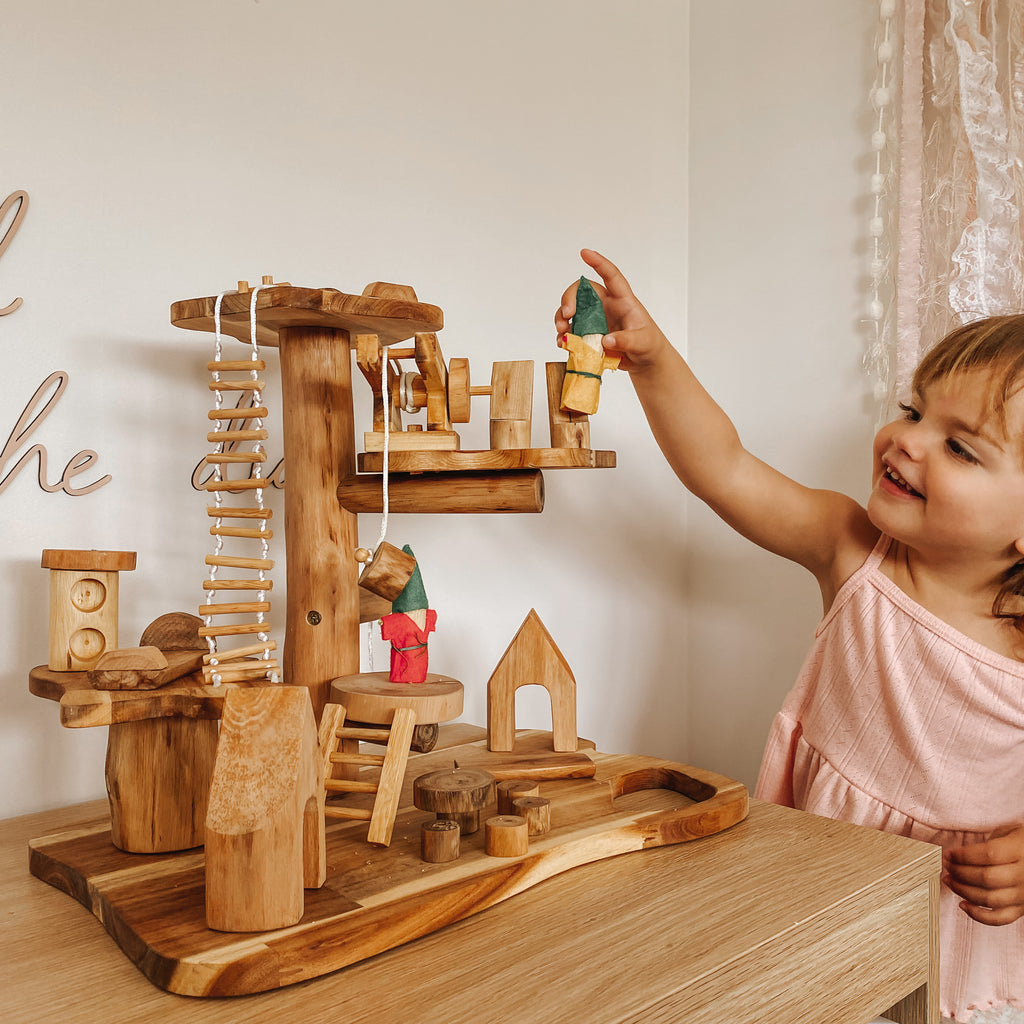 Natural toy tree house made from recycled tree branches