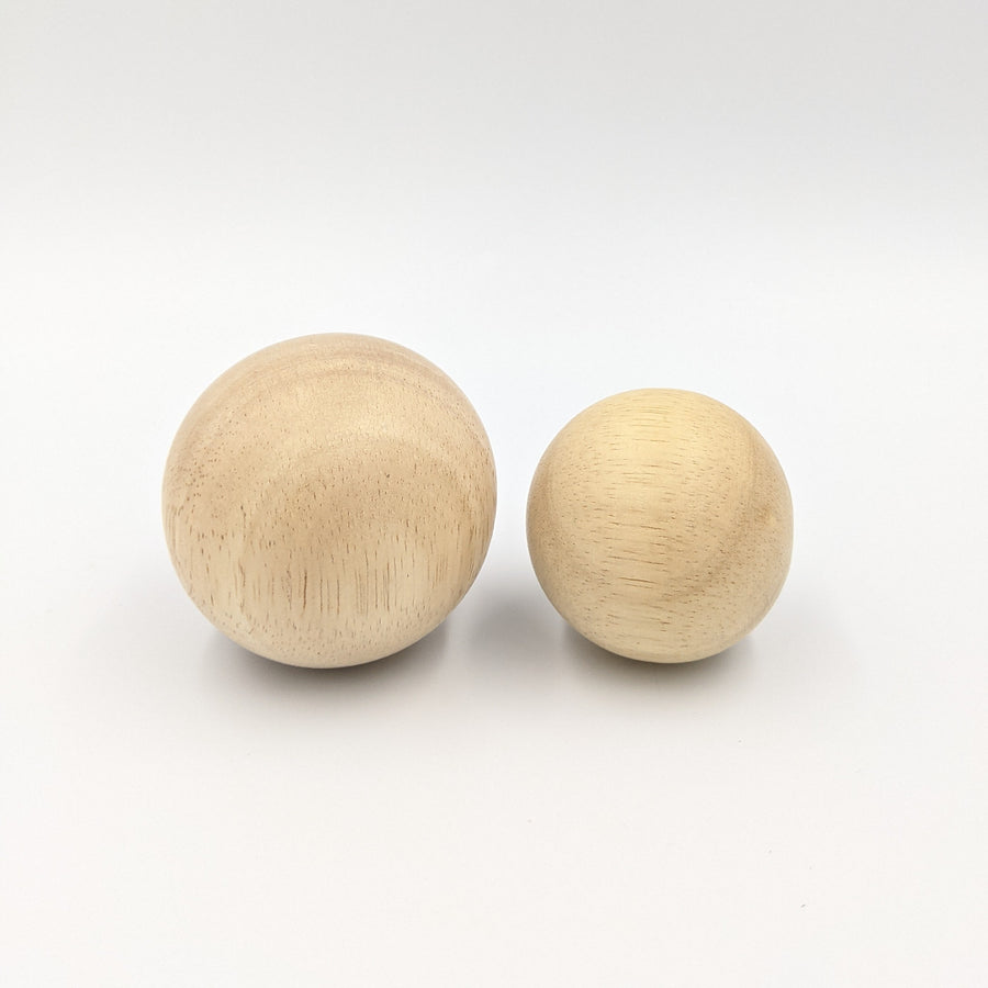 These smooth wooden ball toys offer so many opportunities for open ended play!