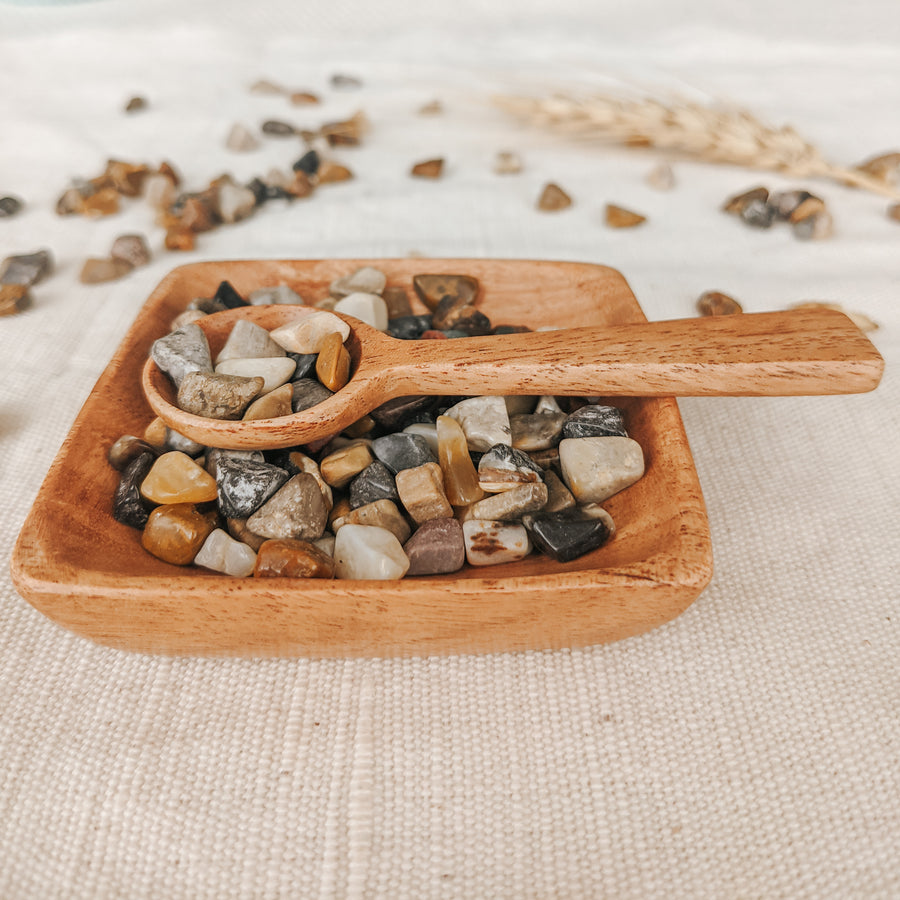  This stunning miniature wooden dish and scoop are handcrafted from neem wood.