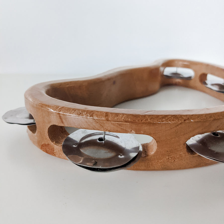 Beautiful wooden tambourine is made from sustainable timber with 6 metal zills.