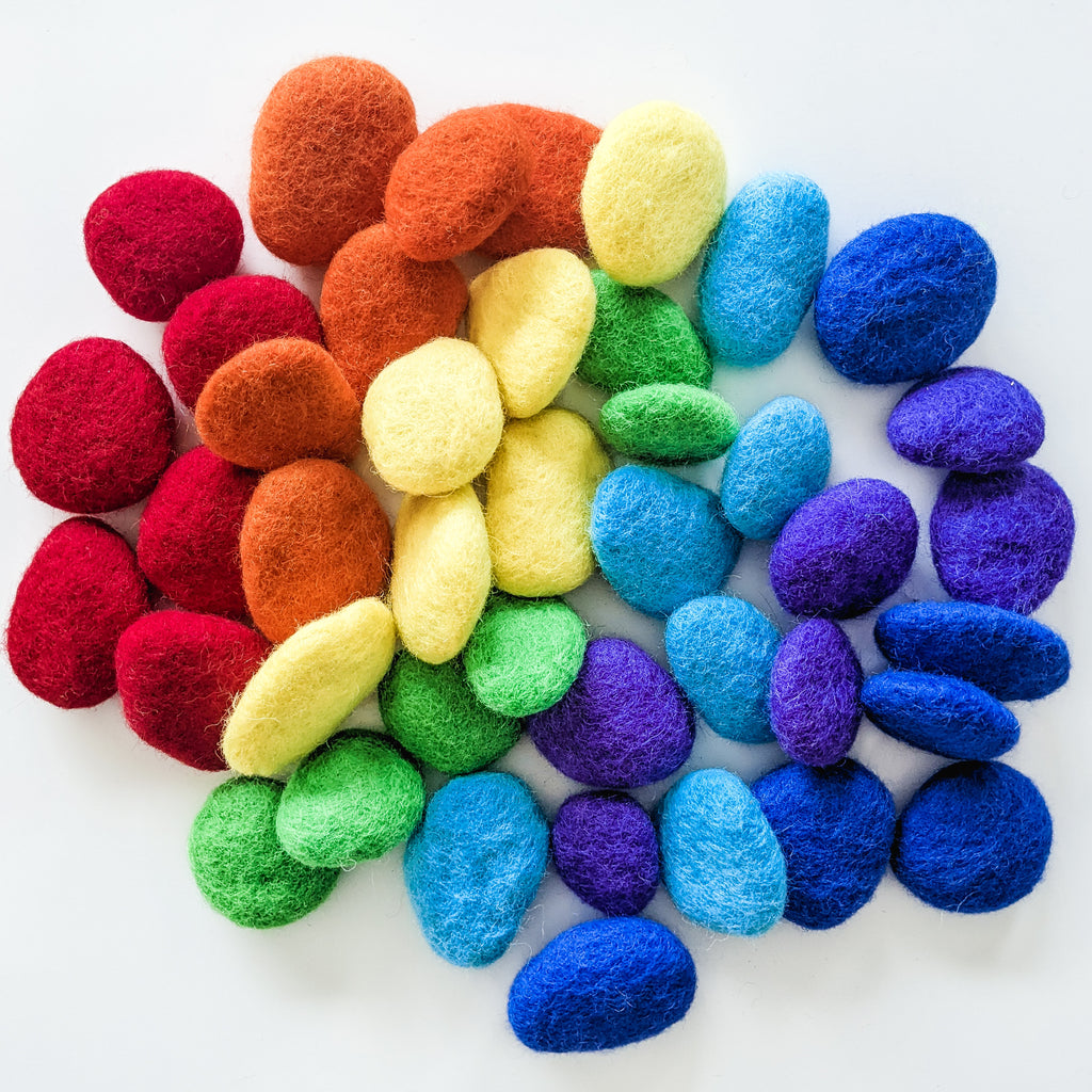 Colourful felt pebble set for toddlers. 