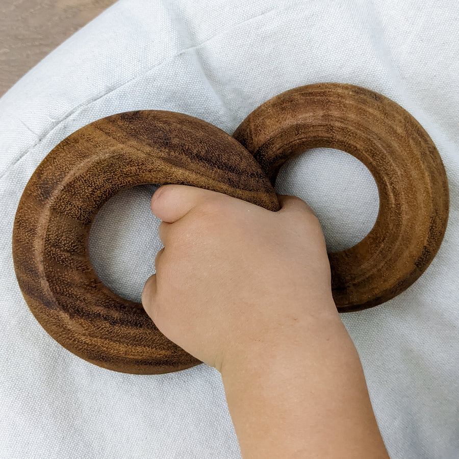 Natural, wooden stacking ring toys.  