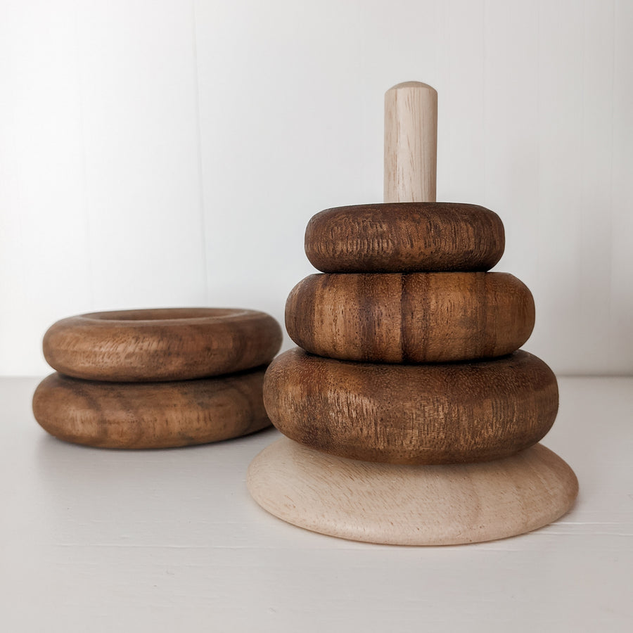 Natural, wooden stacking ring toys.  