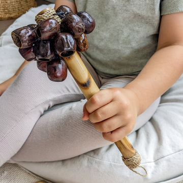 Karet maraca children's percussion instruments made from bamboo, nuts and seed pods. Perfect for sensory and musical play. 