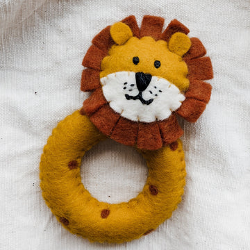Eco-friendly, fair trade, felt lion grasping toy. 