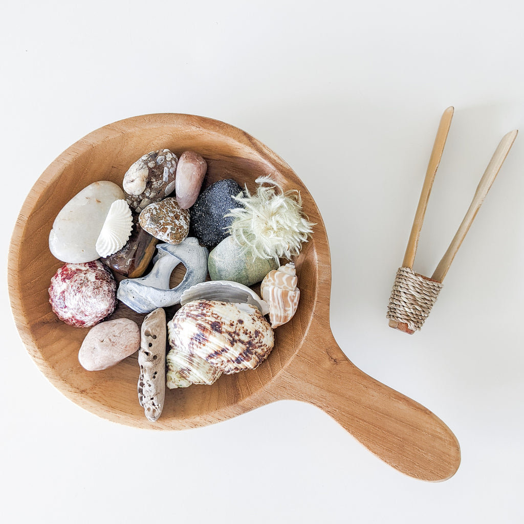 This large wooden scoop toy is perfect for sand and water play.