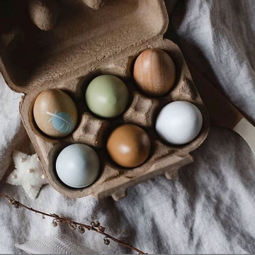 These solid wood eggs are beautifully painted and come in an authentic egg carton. Includes 6 wooden eggs and one felt egg toy - a super sweet addition to any play kitchen.