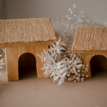 A set of two wooden cottages with beautiful textured roofs - just perfect for imaginative and small world play! 