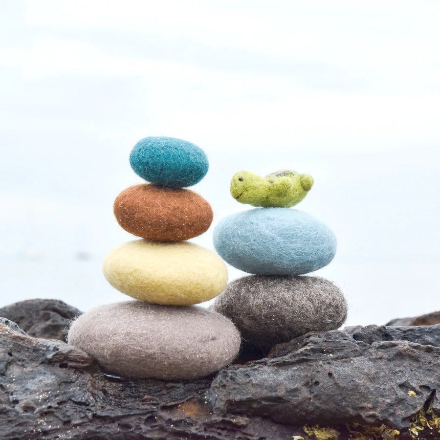 A set of six felt sensory stones and 1 green turtle - made from natural wool felt, with beautiful tactile properties. Eco-friendly and fair trade felt toys. 