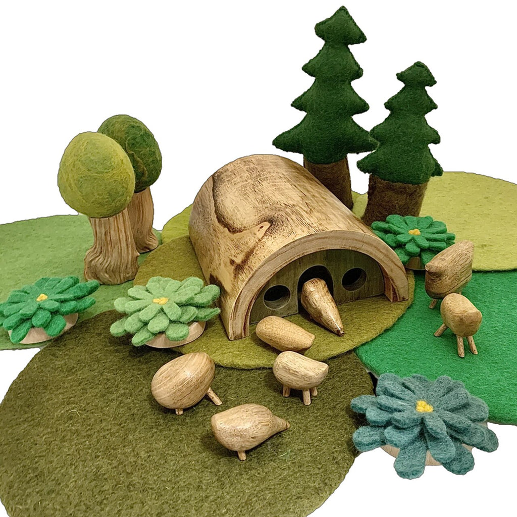 This half log house is a gorgeous accessory for small world play. 