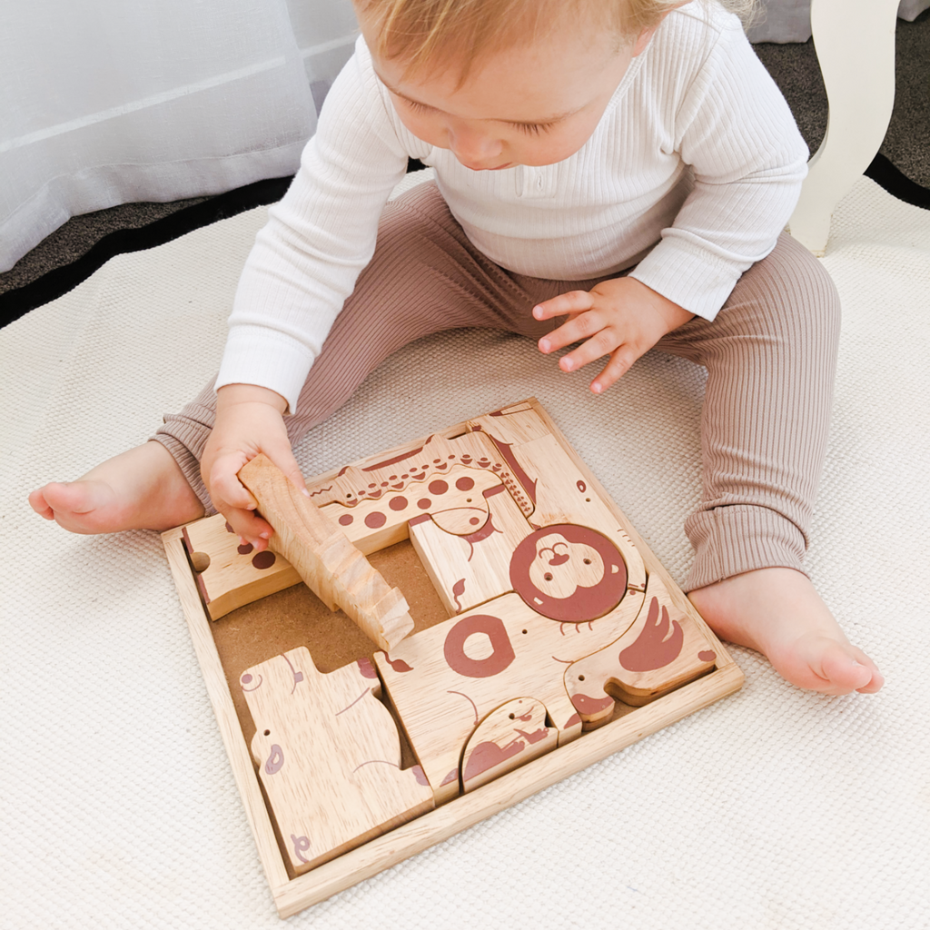 Fair trade wooden puzzle toy – jungle animal set. 
