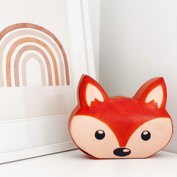 Children’s coin money box with a fox design. Handcrafted from ethically sourced leather.