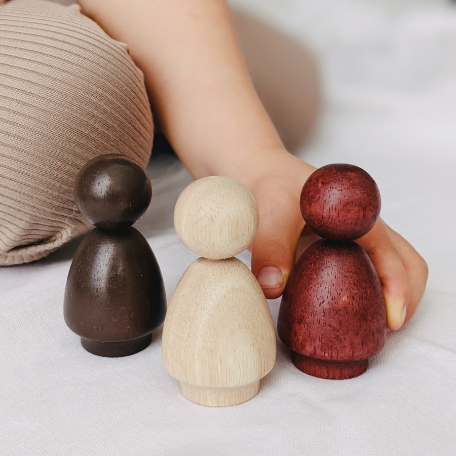 Wooden peg doll figures perfect for open ended play. Ethical, sustainable toy. 