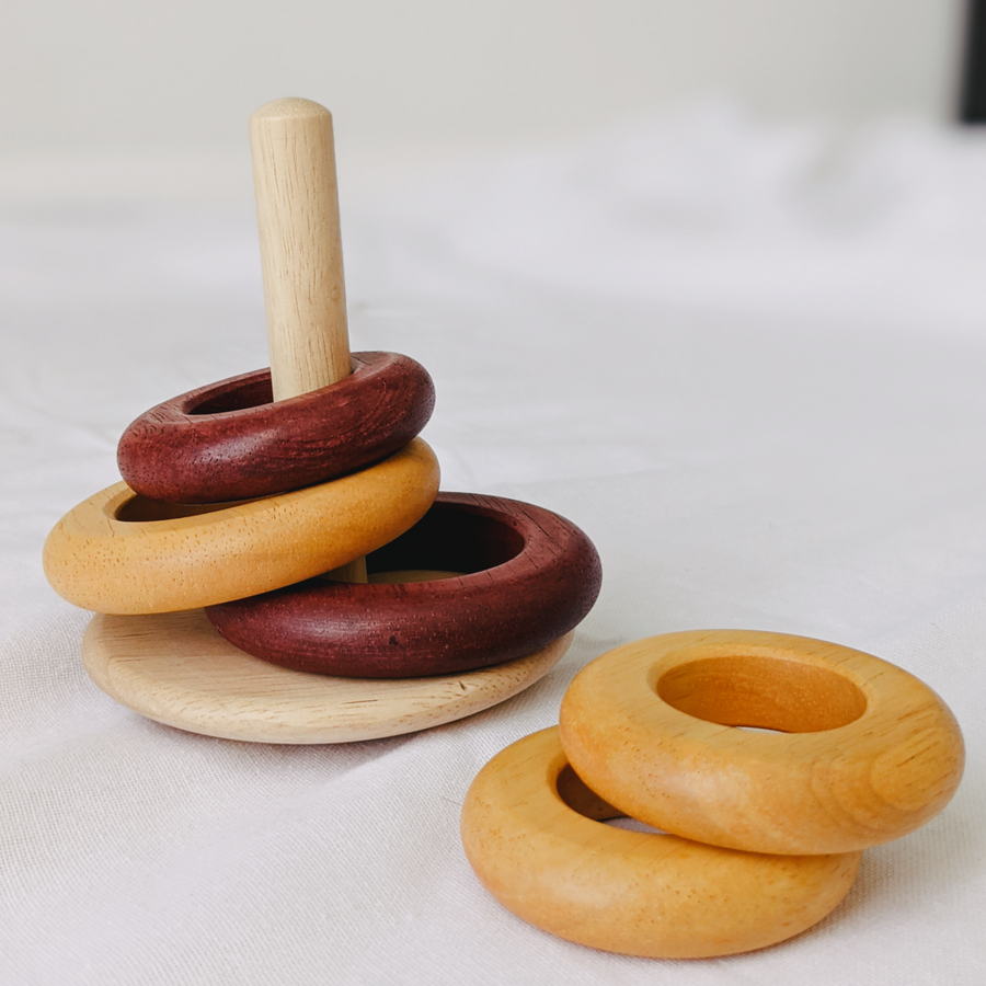 These natural wooden ring toys offer so many opportunities for open ended play. 