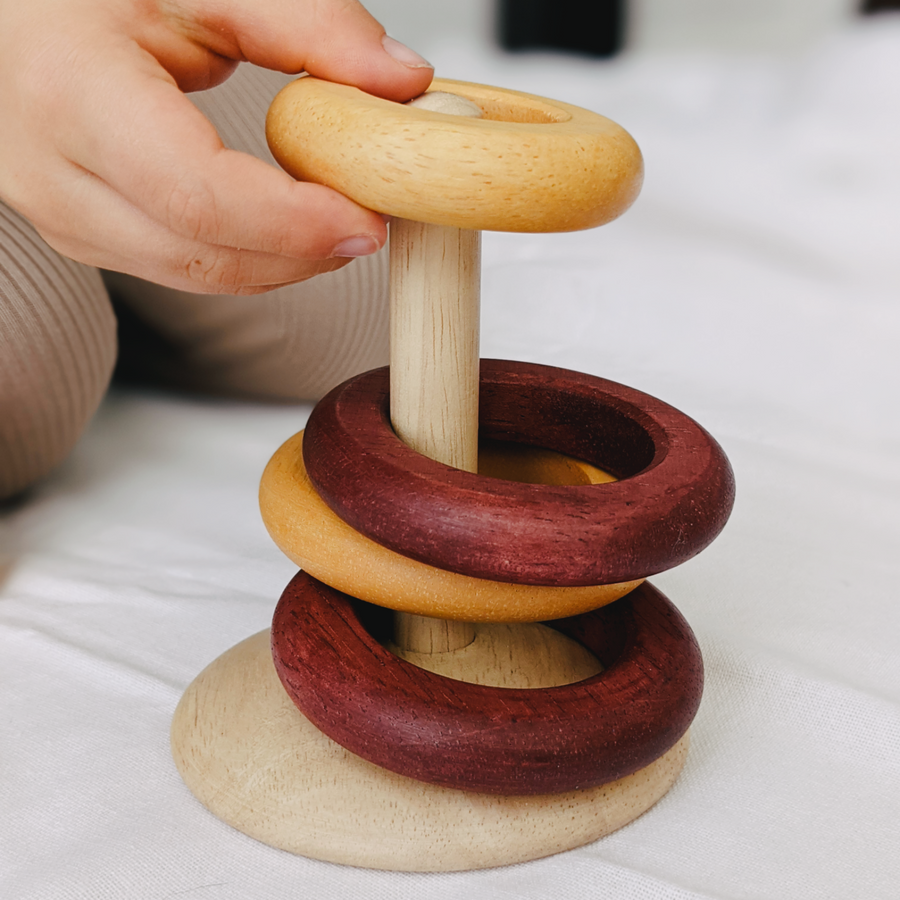 These natural wooden ring toys offer so many opportunities for open ended play. 