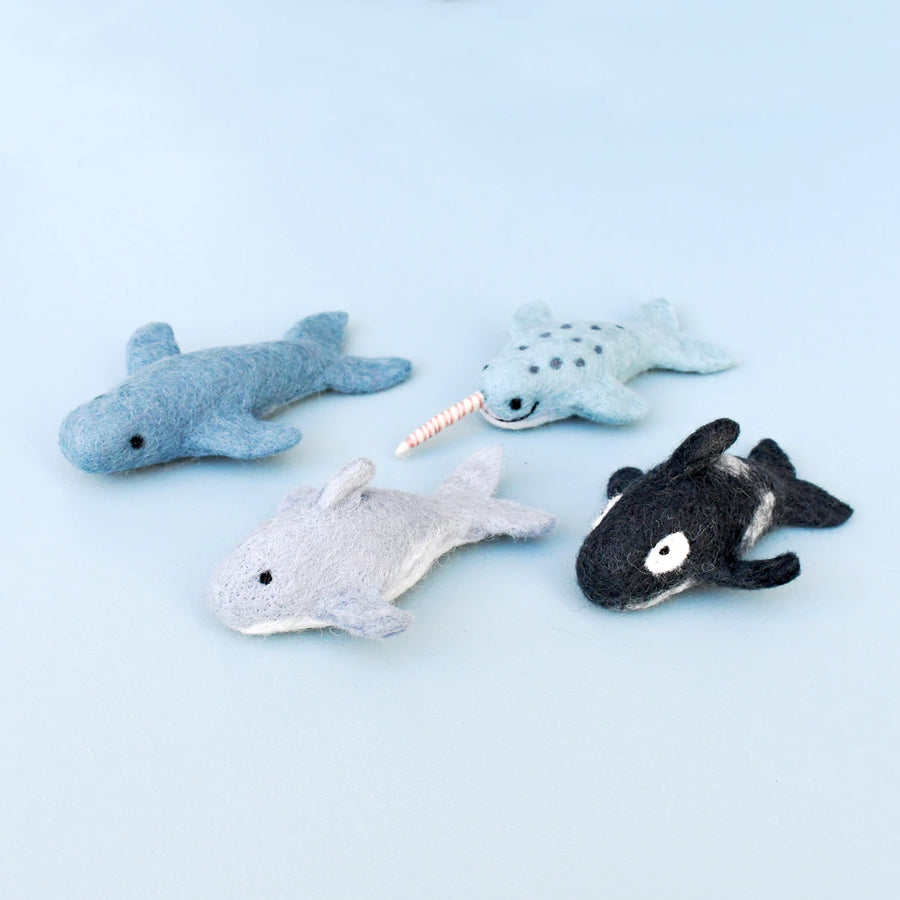 Fairtrade, felt marine mammal toys, including a narwhal, orca and dolphin and killer whale. Ethically-made and eco-friendly. 