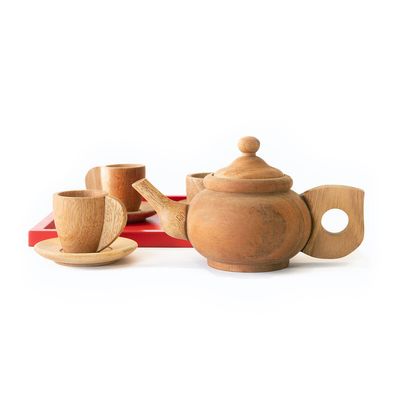 Wooden mahogany toy tea set. This set includes one toy teapot, four cups with saucers and a square red tray.